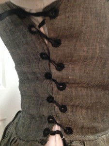 View of hand-sewn eyelets on side-lacing
