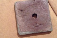 Slate square with a 1/4 inch hole drilled through it